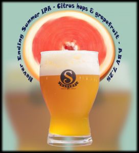 early fall ale in glass with grapefruit
