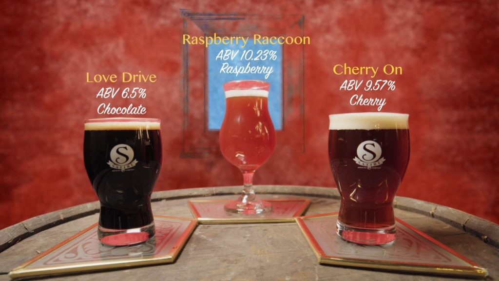 pint glasses with satire brewing valentine beers