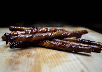 Satire Brewing Company Food bacon wrapped squirrel sticks